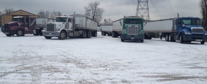 Semis that belong to our fellow farmer friends that came to help us back in December.